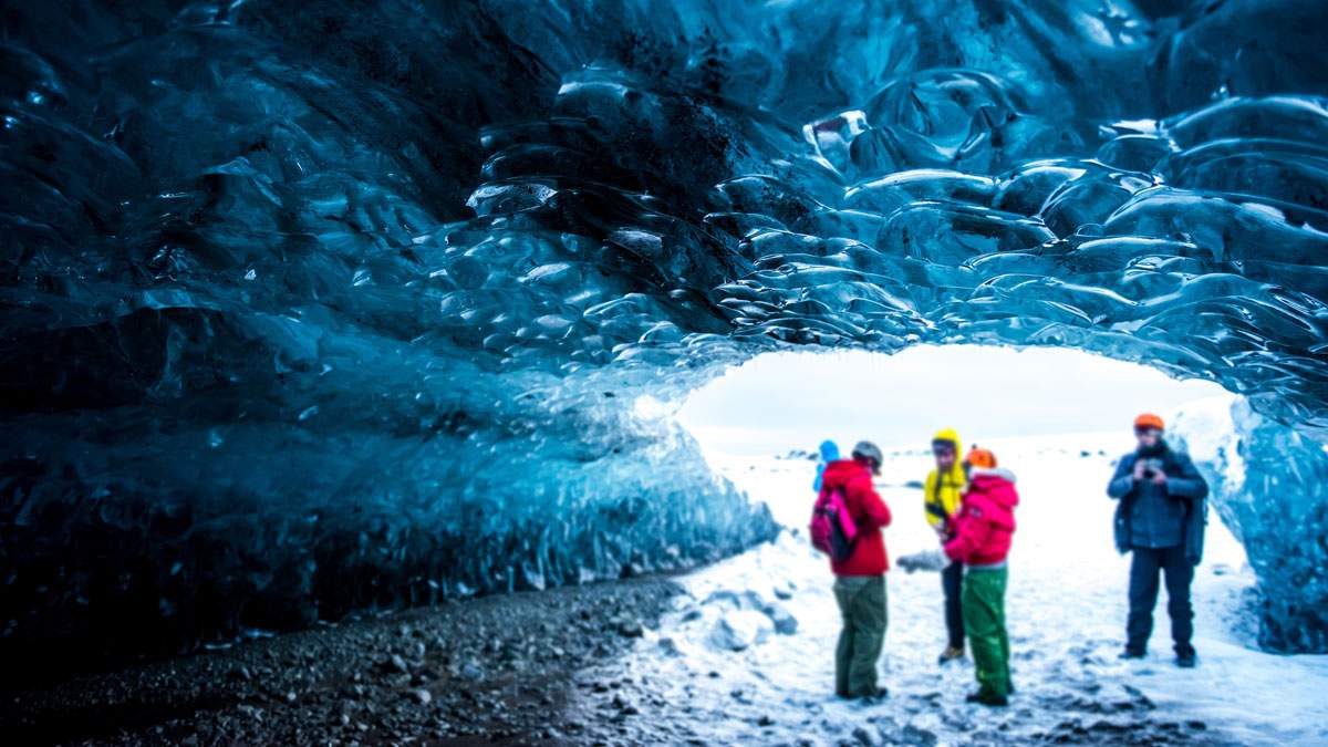 Group of people on a glacier cave tour in Iceland