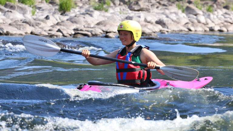 Young girl Kayaking in Norway