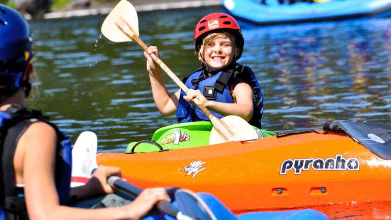 A young member kayaks in Norway
