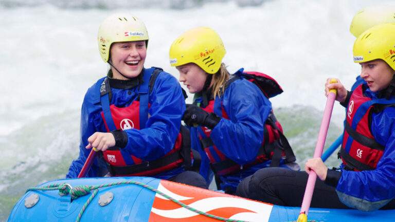 Girls white water rafting in Norway