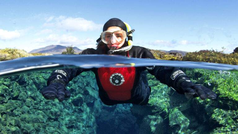young person snorkelling in Iceland