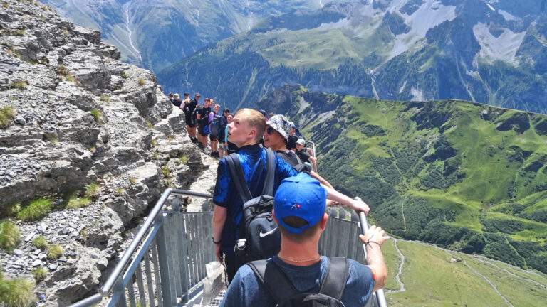 Group of children on a hike in Switzerland