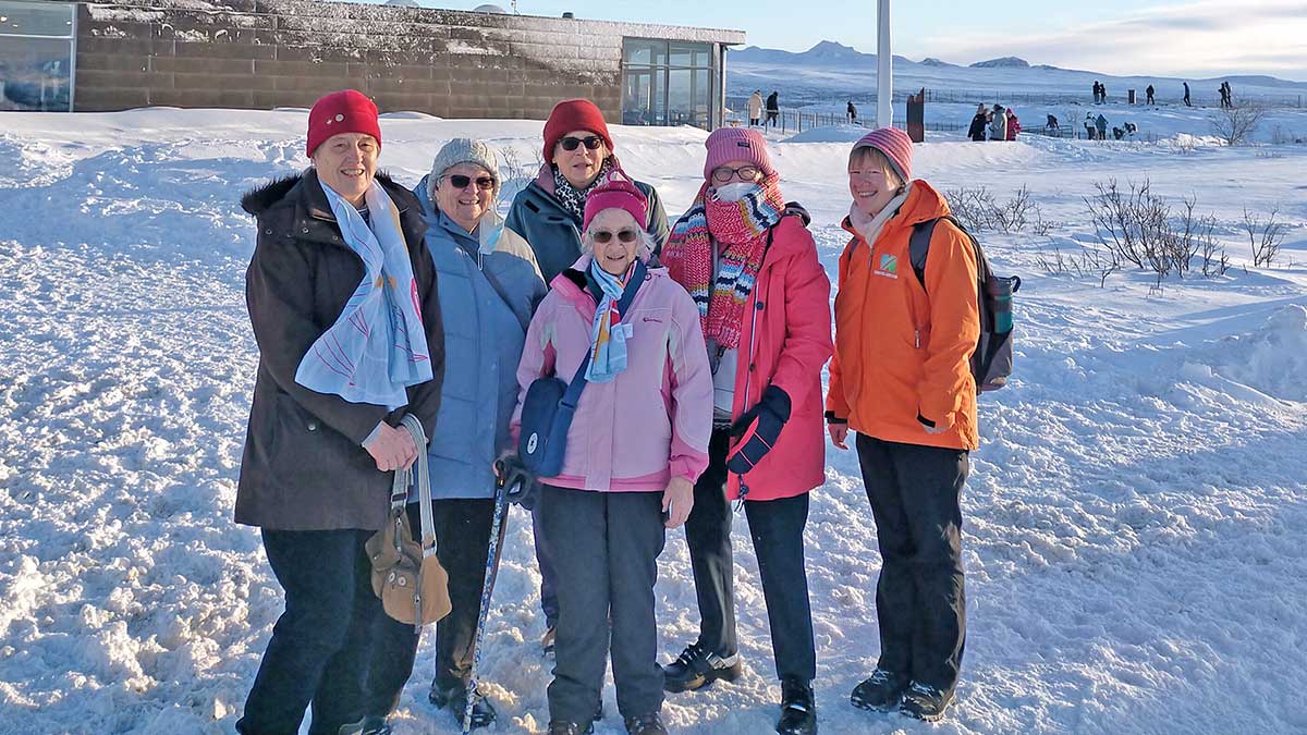 Trefoil group and tour rep in Iceland