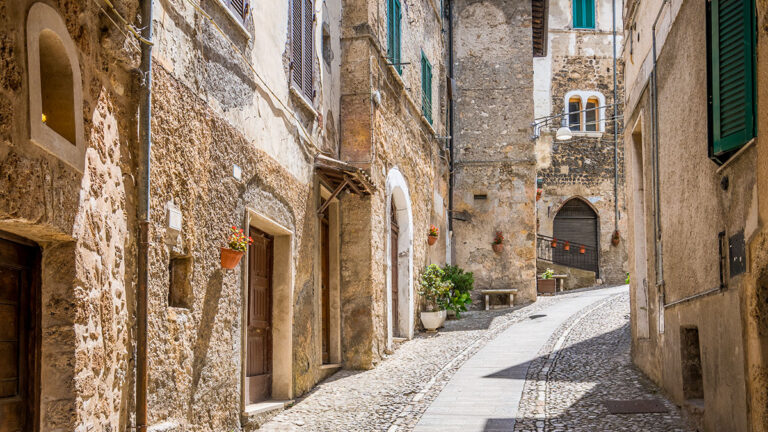 Subiaco old town in a summer morning, province of Rome, Latium, central Italy. Subiaco is a town and comune in the Metropolitan City of Rome, in Lazio, central Italy, 40 kilometres from Tivoli alonge the river Aniene.