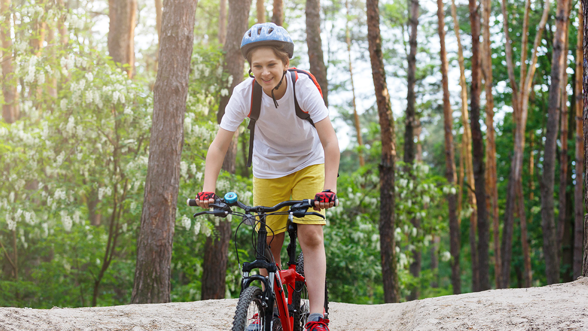 young scout mountain biking