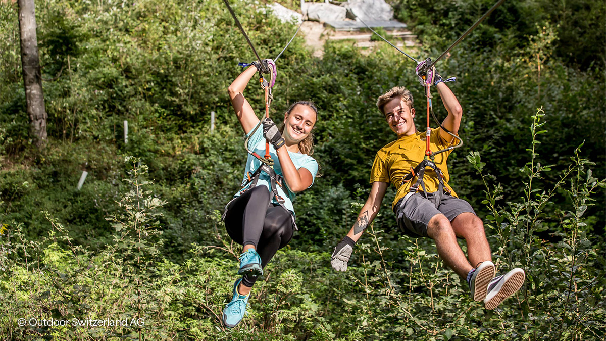 boy and girl on high ropes