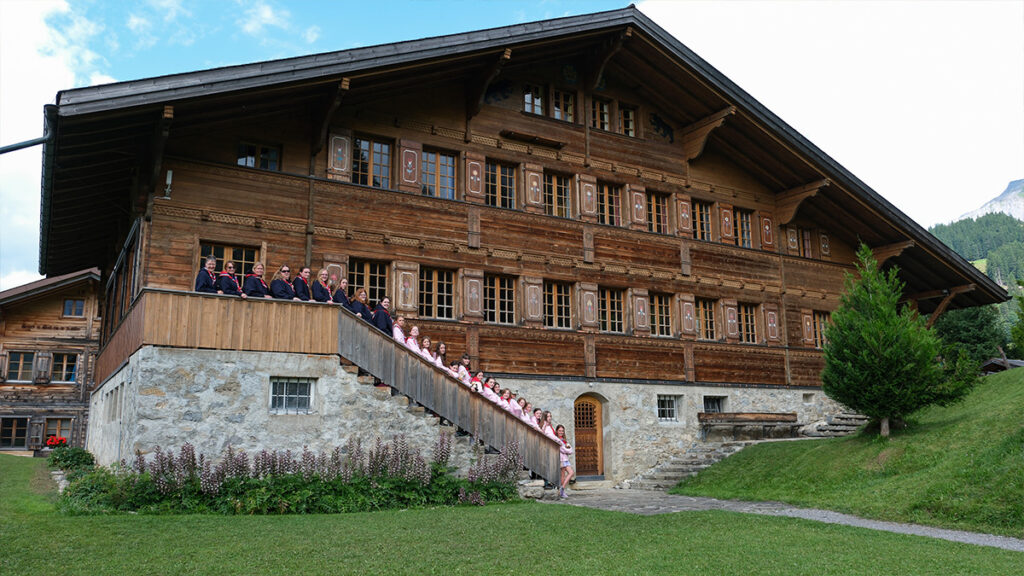 Hexham guides posing outside of Our Chalet for a photo
