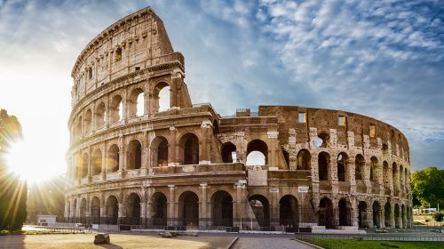 Colosseum in Rome and morning sun, Italy. Famous historic Colosseum in Rome and morning sun, old civilisation, Italy