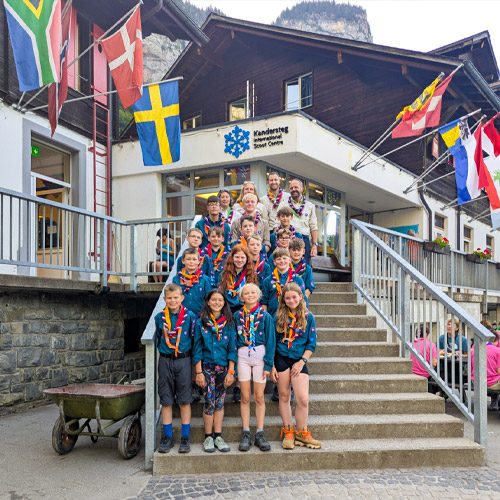 Scouts posing for a photo outside of KISC