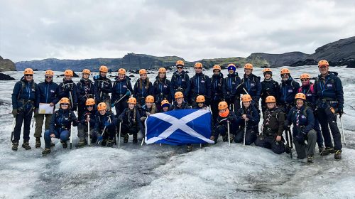 A scout group in Iceland on a glacier hike