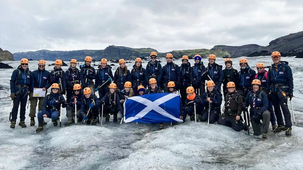 A scout group in Iceland on a glacier hike
