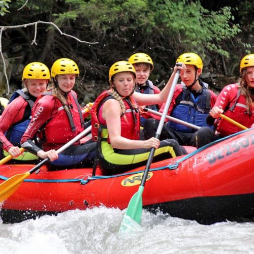 switzerland-rafting Group of children white water rafting