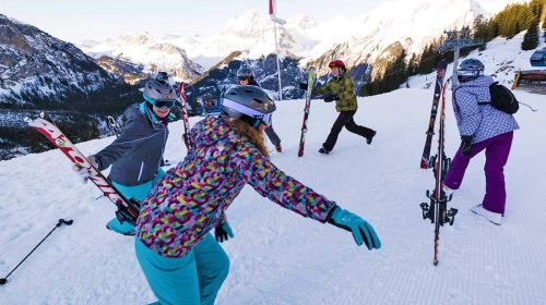 Young people having fun in the snow at KISC Switzerland